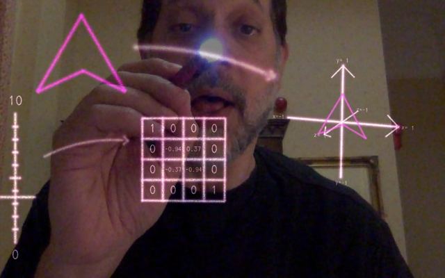 Video still: Ken Perlin drawing glowing diagrams in the air in augmented reality